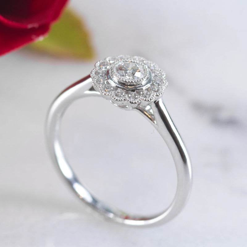 Dora 18ct white gold floral style engagement ring