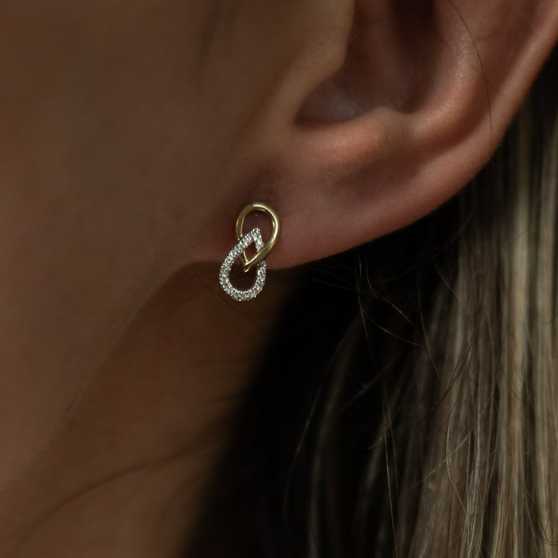9 carat white gold stone set earrings