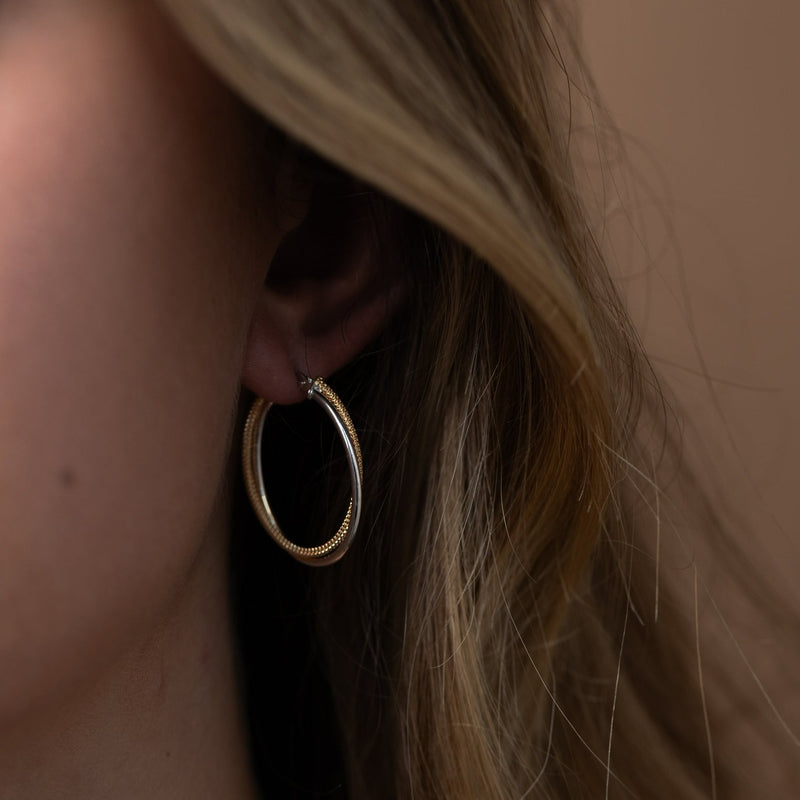 9 carat gold oval two tone earrings