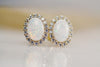 9 carat yellow gold Opal and cubic zirconia  earrings