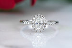 Mia 18ct white gold oval halo  engagement ring with diamond set shoulders