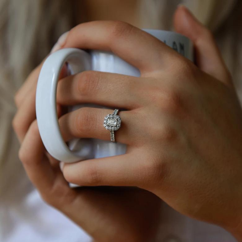 Emerald cut Halo engagement ring